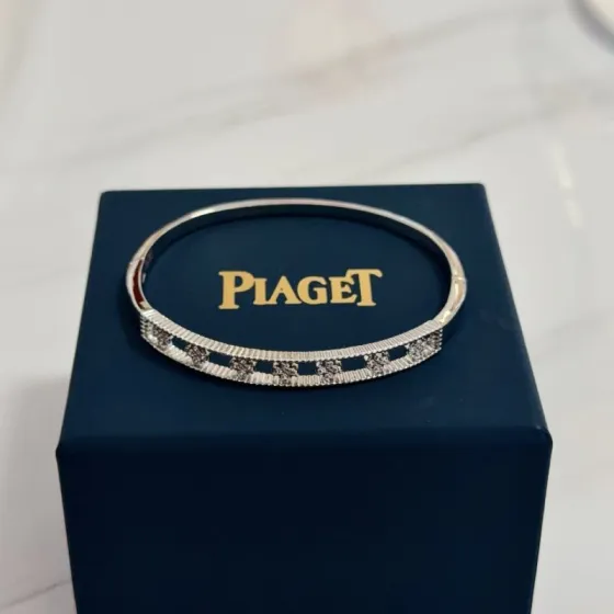 Piaget Possession bracelet 18k white gold with clear diamond accents 17cm inner circumference