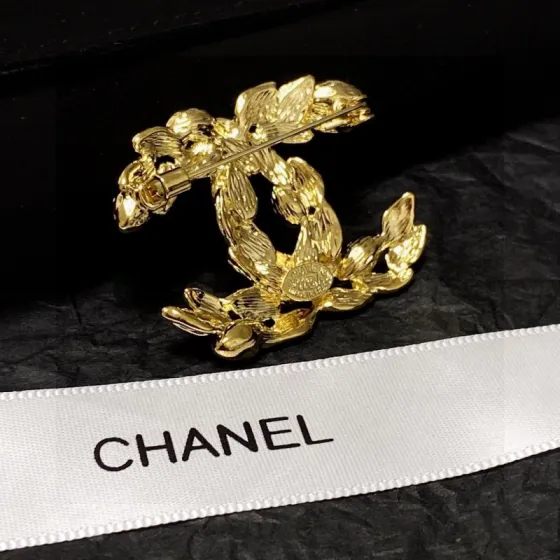 Chanel CC Wheat Leaf Crystal Brooch brooch Gold-tone metal with clear faceted marquise-cut crystals Approximately 4 5cm x 3