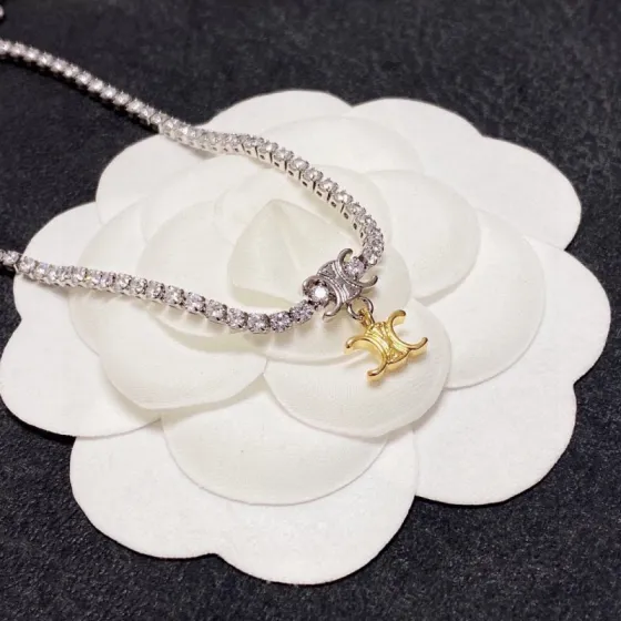 Celine Triomphe necklace silver-toned metal with clear cubic zirconia gold-toned Triomphe charm 38cm