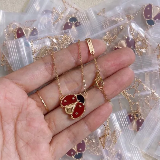 Van Cleef Arpels Lucky Spring Ladybug necklace Rose gold metal with red carnelian and black onyx accents 42cm