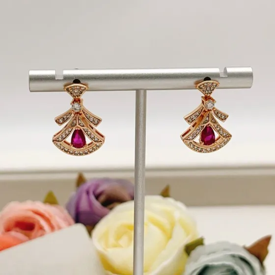 Bvlgari Divas Dream earrings Rose gold with clear pave diamonds and pear-shaped ruby red gemstones 1 8cm drop length