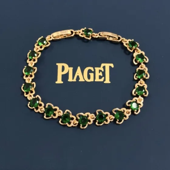 Piaget Rose bracelet Yellow gold with emerald green gemstones 18cm
