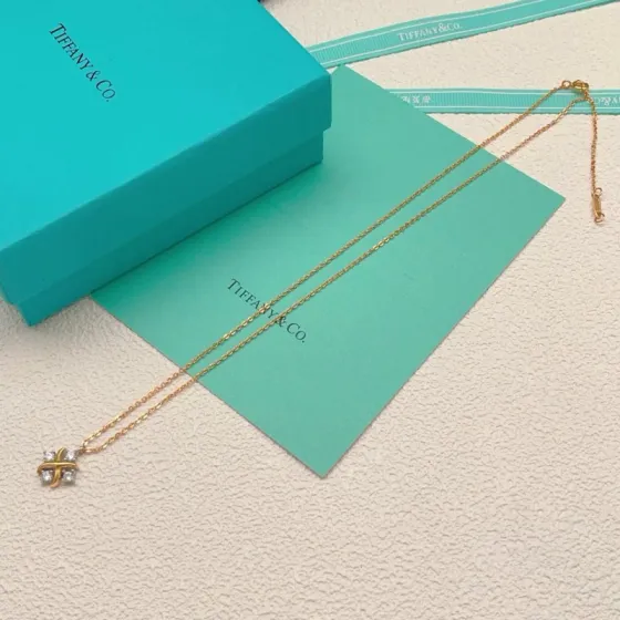 Tiffany Co Schlumberger Lynn necklace yellow gold with clear diamond accents 16 inches