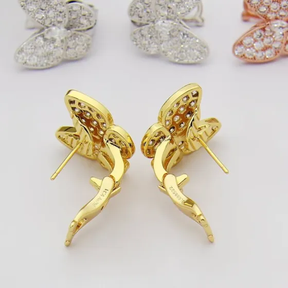 Van Cleef Arpels Two Butterfly earrings 18K yellow gold with clear diamonds 18K white gold with clear diamonds 18K rose gold with clear diamonds One Size