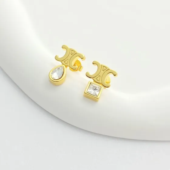 Celine Triomphe Asymmetric Crystal Stud Earrings earrings Gold-tone metal with clear faceted crystals One Size 1cm stud width