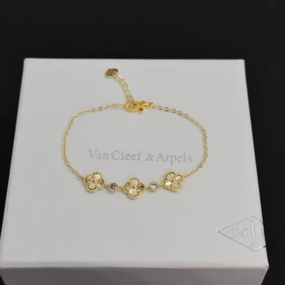 Van Cleef Arpels Alhambra bracelet yellow gold with clear accent stones 18cm with 3cm extender