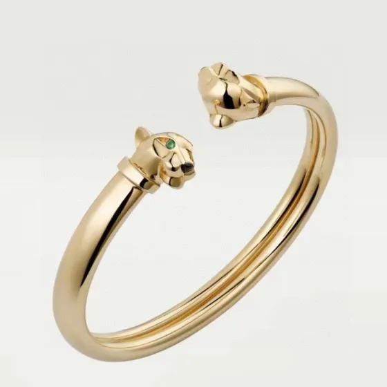 Cartier Panthere de Cartier bracelet Yellow gold with green tsavorite garnet and black onyx accents 17