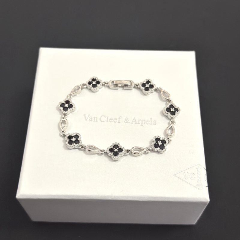 Van Cleef Arpels Alhambra bracelet silver-toned metal with black onyx and clear diamond accents 18cm