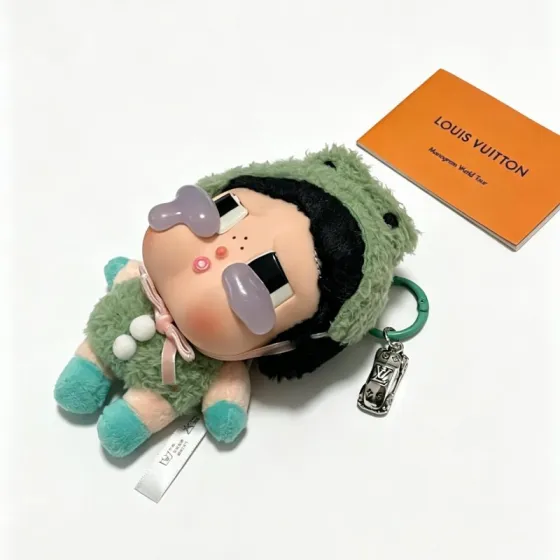 Louis Vuitton Anger Forest pendant silver metal charm green leather lanyard green plush doll with pink and teal accents 20cm lanyard length