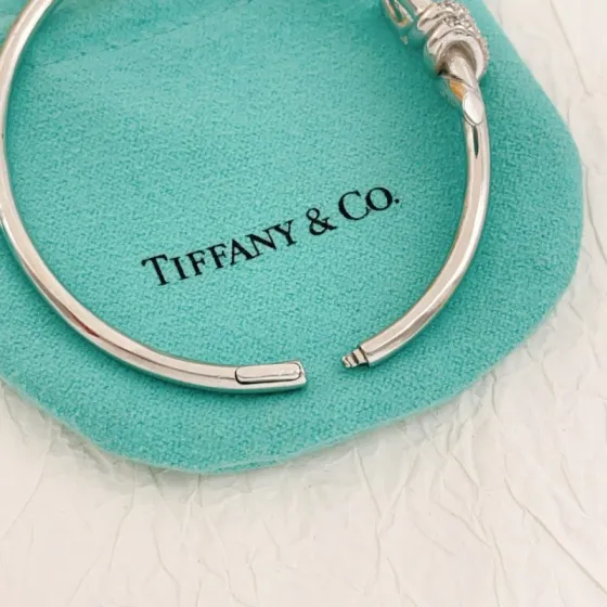Tiffany Co Knot bracelet Silver-toned metal with clear diamond accents 17cm