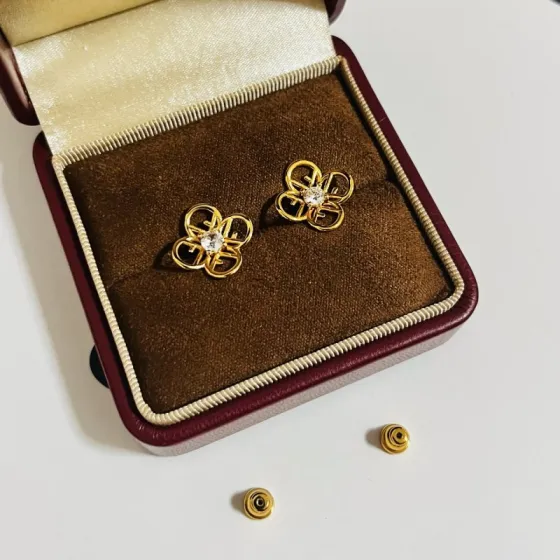 Fendi FF Logo Flower Stud Earrings earrings gold-tone metal with clear faceted center stone 10mm stud diameter