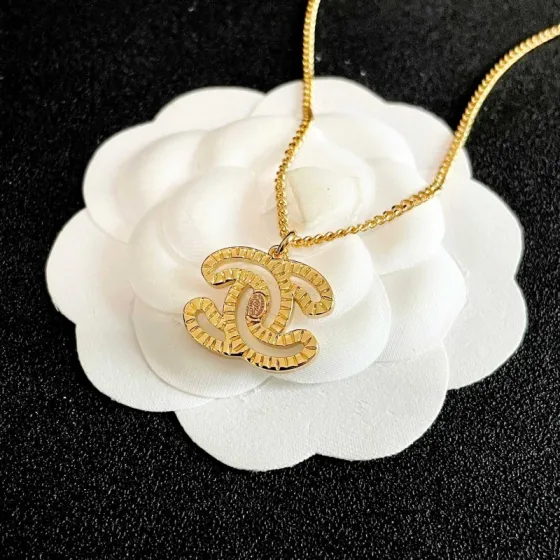 Chanel CC Logo Pendant Necklace necklace Gold-tone metal with white enamel fill 42cm