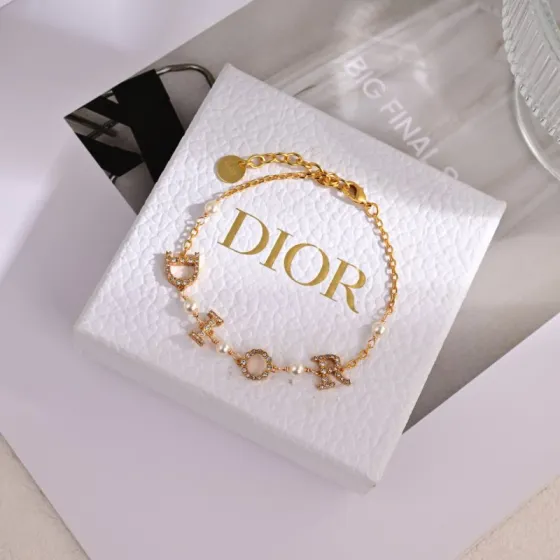 Dior Dio r evolution bracelet gold-tone metal clear crystal white faux pearl 17cm