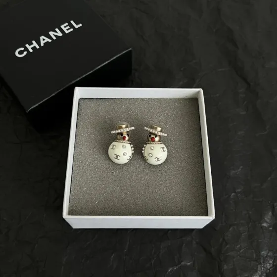 Chanel Snowman CC Holiday Collection earrings Light gold-tone metal cream white enamel clear crystal accents red enamel nose faux pearl trim One Size stud earrings no visible length marking