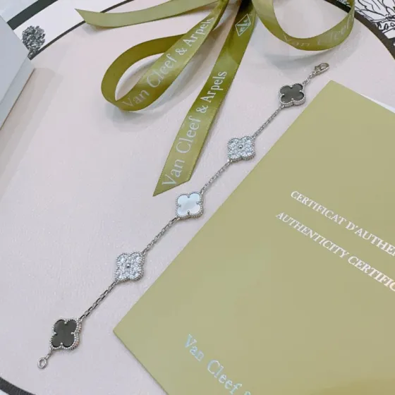 Van Cleef Arpels Alhambra bracelet Silver-toned metal with gray mother-of-pearl white mother-of-pearl and clear diamond accents 18cm