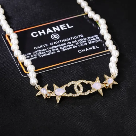 Chanel CC Star Pearl Choker necklace Gold-tone metal white faux pearls clear crystals opalescent pink accent stones 38cm with 5cm extender