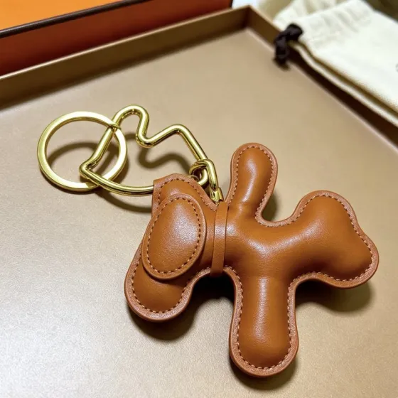 Hermes Buddy Dog Leather Charm pendant gold tone metal tan smooth leather 3cm key ring diameter charm length 8cm