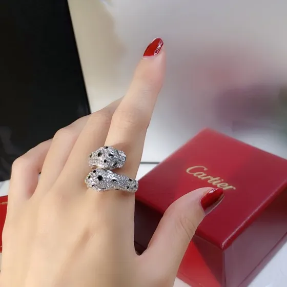Cartier Panthere de Cartier ring 18K white gold paved diamonds black onyx spots tsavorite garnet eyes 54