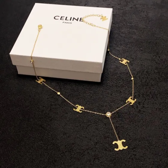 Celine Triomphe Multi-Logo Lariat necklace 14K gold-toned metal with clear cubic zirconia accents 45cm with 5cm extender
