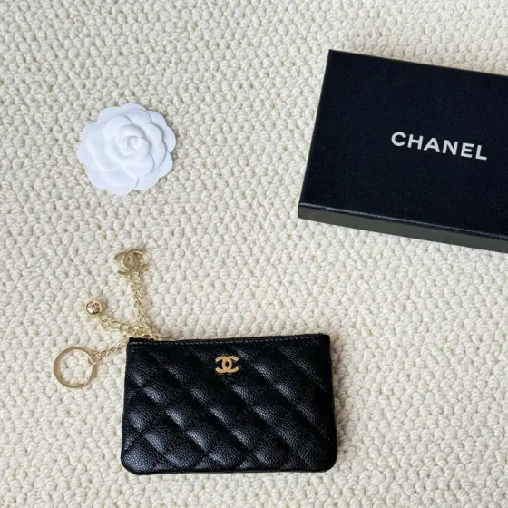 Chanel Quilted Caviar CC Zip Key Pouch pendant Black grained caviar leather with gold-tone metal hardware red interior lining 12cm chain length