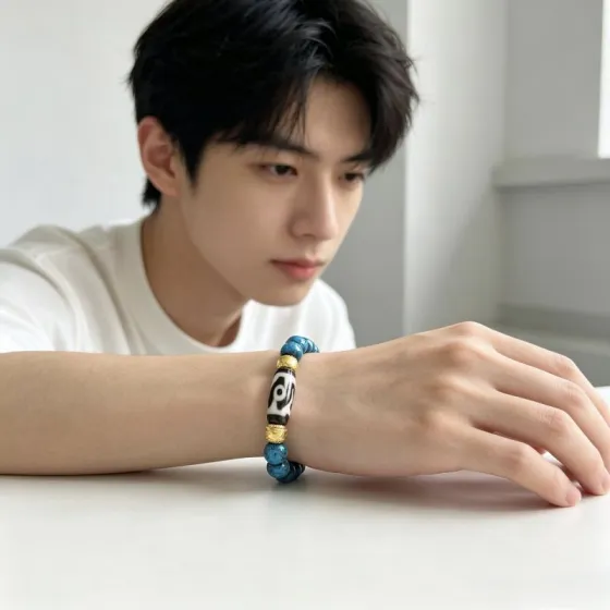 Gucci Anger Forest bracelet Gold-tone metal blue variegated stone beads black and white patterned dzi-style bead 18cm