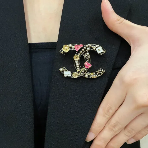 Chanel CC Logo Heart Charms Brooch brooch gold tone metal with black enamel pink enamel hearts white enamel bag charms white faux pearls 3 5cm width