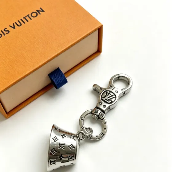 Louis Vuitton Anger Forest Bell Key Charm pendant silver-toned metal with black enamel monogram detailing 9cm total length