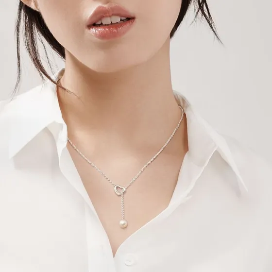 Tiffany Co Elsa Peretti Open Heart Pearl Lariat necklace 18k yellow gold with white freshwater pearl 16 inches