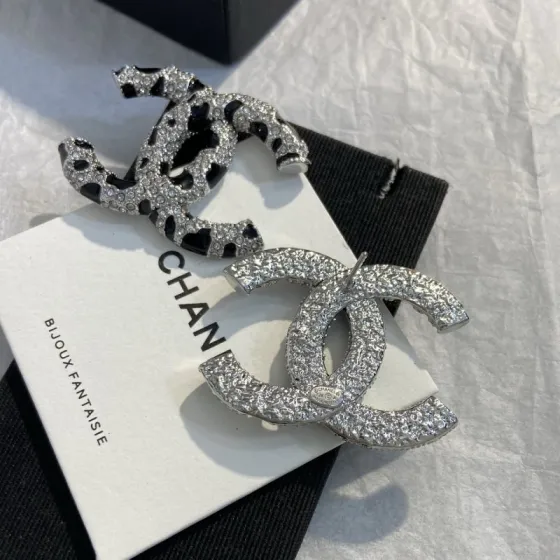 Chanel 26A CC Logo Leopard Print Stud Earrings earrings Silver-toned metal with clear crystal pave and black enamel leopard spot detailing Approximately 2 5cm per earring
