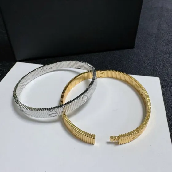 Cartier Love Ribbed Cuff bracelet 18k yellow gold 18k white gold no gemstones 17