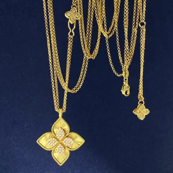 Roberto Coin Princess Flower necklace 18k yellow gold with pave diamonds 18k white gold with pave diamonds 18 inch adjustable chain