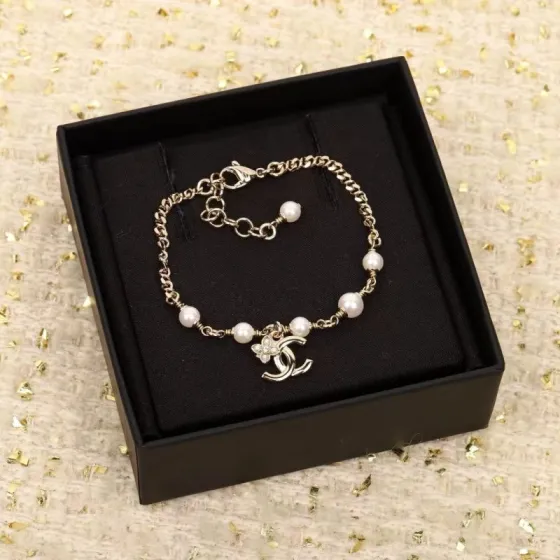 Chanel CC Logo Pearl Flower Charm bracelet Light gold metal white faux pearl clear crystal 18cm