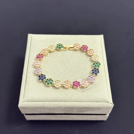 Van Cleef Arpels Fleurette Multi Gemstone Bracelet bracelet Yellow gold with multicolor gemstones fuchsia pink emerald green sapphire blue lavender purple champagne clear white 18cm