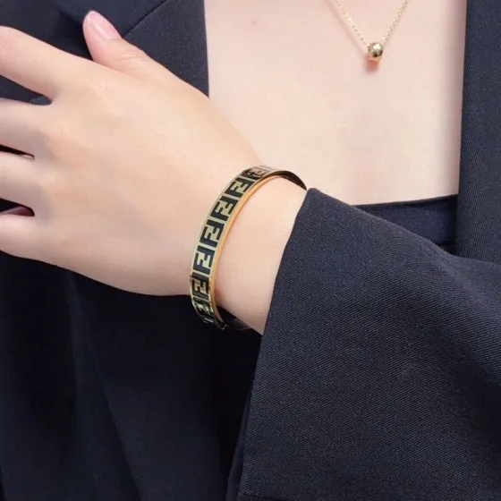 Fendi FF Logo Enamel Bangle bracelet gold-tone metal with black enamel FF monogram 17cm inner circumference