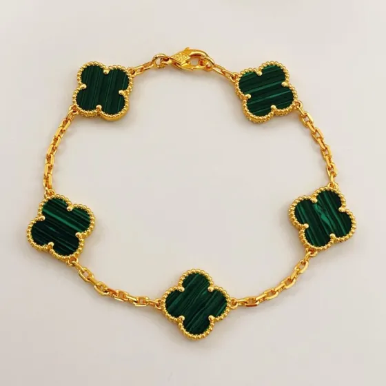 Van Cleef Arpels Vintage Alhambra bracelet Yellow gold with green malachite clover motifs 18cm