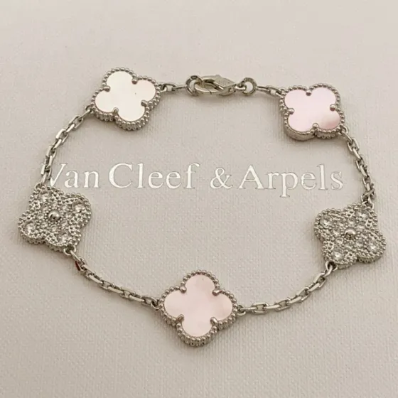 Van Cleef Arpels Alhambra bracelet Silver-toned white gold metal with pink mother-of-pearl white mother-of-pearl and clear diamond accents 17cm