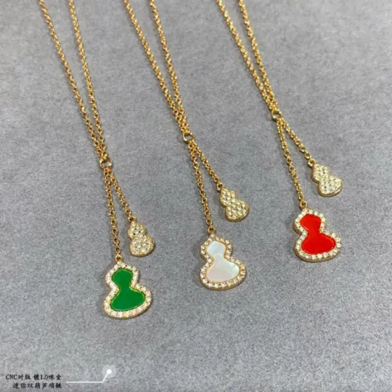Qeelin Kirin Mini Double Gourd necklace Gold plated metal with clear high carbon diamond accents available with green enamel white mother-of-pearl or red enamel inlay 42cm with 3cm extender