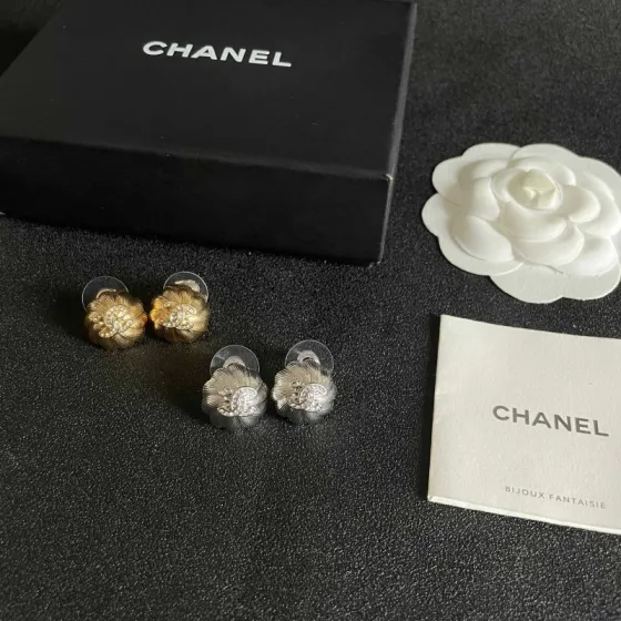 Chanel CC Camellia Stud Earrings earrings Gold-tone metal with clear crystal accents Silver-tone metal with clear crystal accents 1 2cm diameter