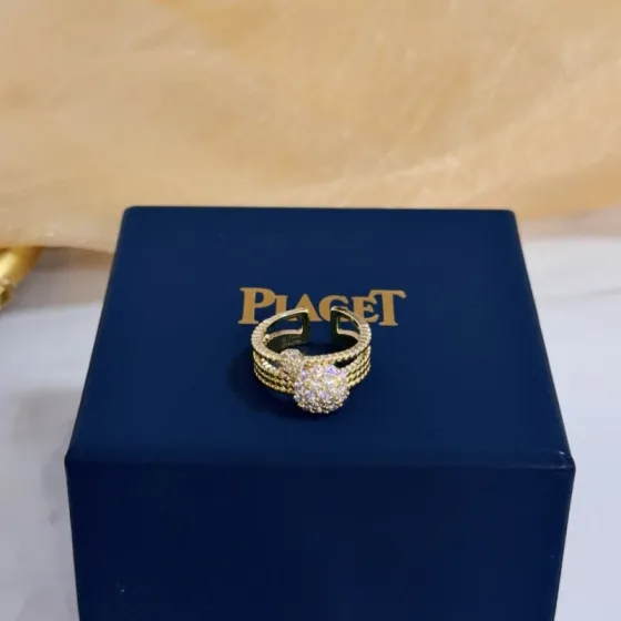 Piaget Possession ring yellow gold with clear pave diamonds adjustable open band