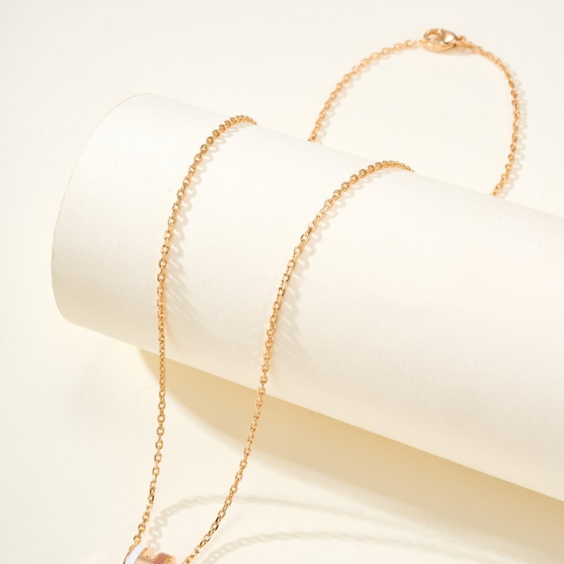 Hermes Mini Pop H Rocabar necklace rose gold metal with white and brown enamel 40cm