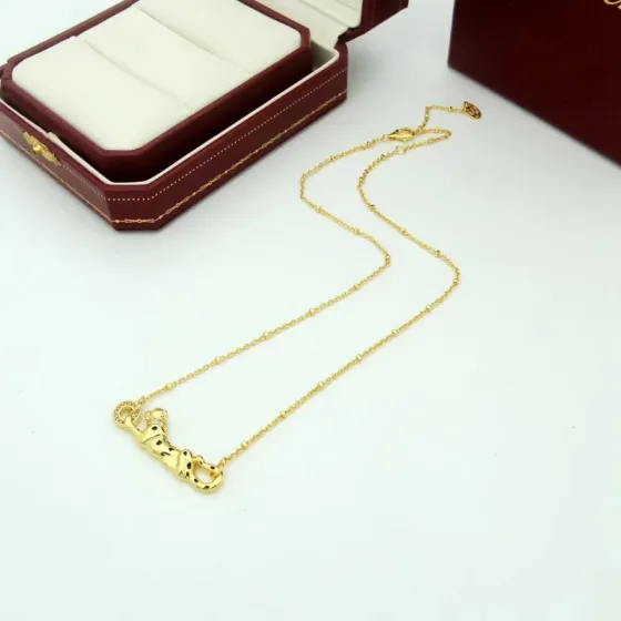 Cartier Panthere de Cartier necklace 18K yellow gold black lacquer spots tsavorite garnet diamond 42cm