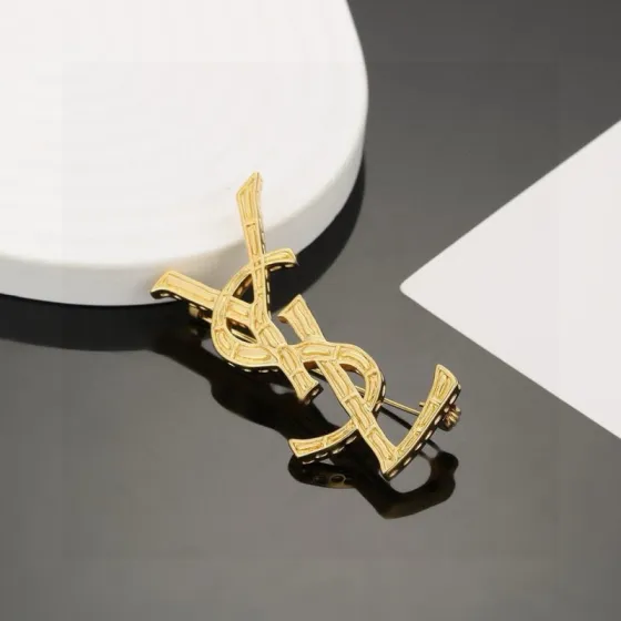 Saint Laurent Cassandre Bamboo Textured Monogram brooch gold tone metal 4 5cm width