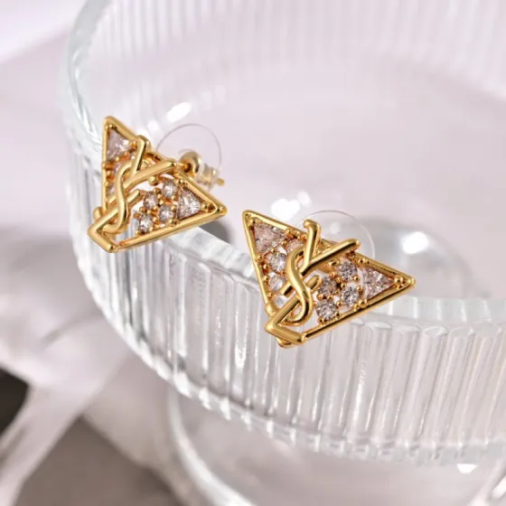 Saint Laurent YSL 1961 Triangle Monogram earrings Gold-tone metal with clear cubic zirconia Silver-tone metal with clear cubic zirconia 1 5cm stud length