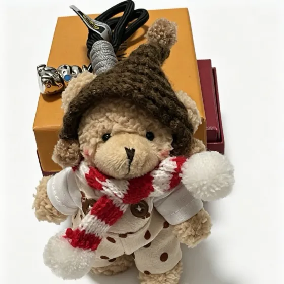 Louis Vuitton Anger Forest pendant silver metal with blue enamel beige plush brown knit red and white knit black cord gray cord 12cm