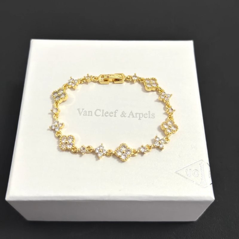 Van Cleef Arpels Alhambra bracelet gold-tone metal with clear diamond-like stones 17cm