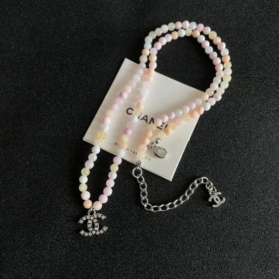 Chanel CC Logo Pastel Bead Choker necklace Silver-tone metal with clear crystal accents pastel pink cream pale yellow and white beaded chain 40cm with 5cm extender