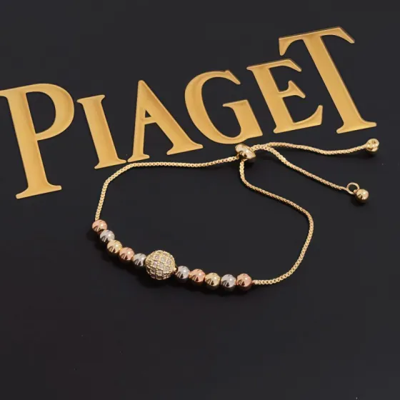 Piaget Possession bracelet tri-tone yellow gold rose gold white gold metal with clear diamond pave accent bead adjustable sliding chain maximum length 22cm