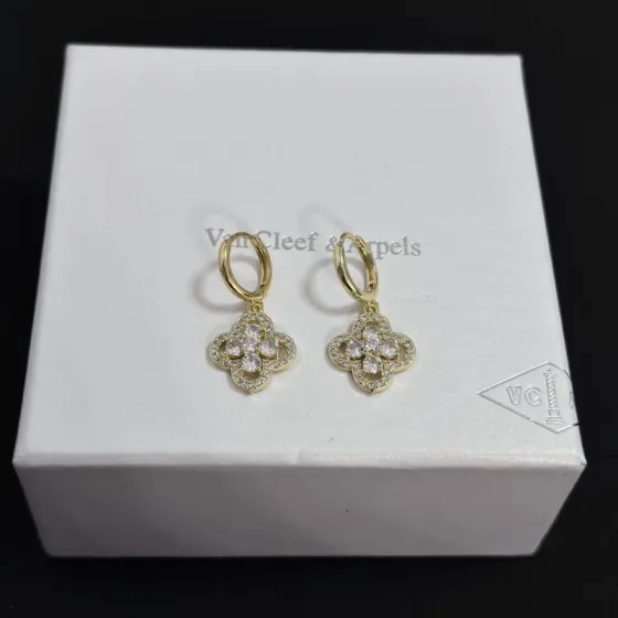 Van Cleef Arpels Alhambra earrings yellow gold metal clear diamond stones 12mm hoop diameter 10mm charm length