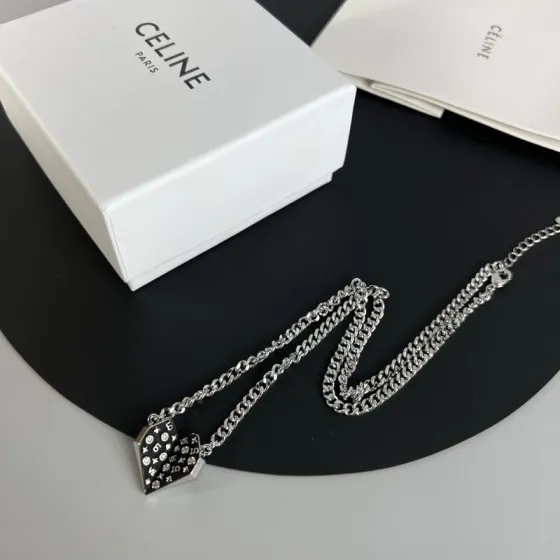 Celine Monogram Studded Split Heart Pendant necklace Silver-toned metal with black enamel and clear crystal accents 60cm