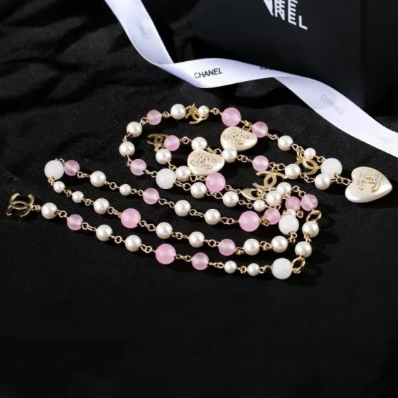 Chanel CC Heart Pearl Bead Long Chain necklace Gold-tone metal white faux pearl pink translucent bead white resin heart charm with crystal CC logo 80cm